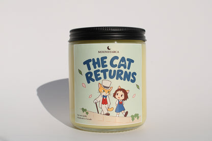 The cat returns Inspired Candle
